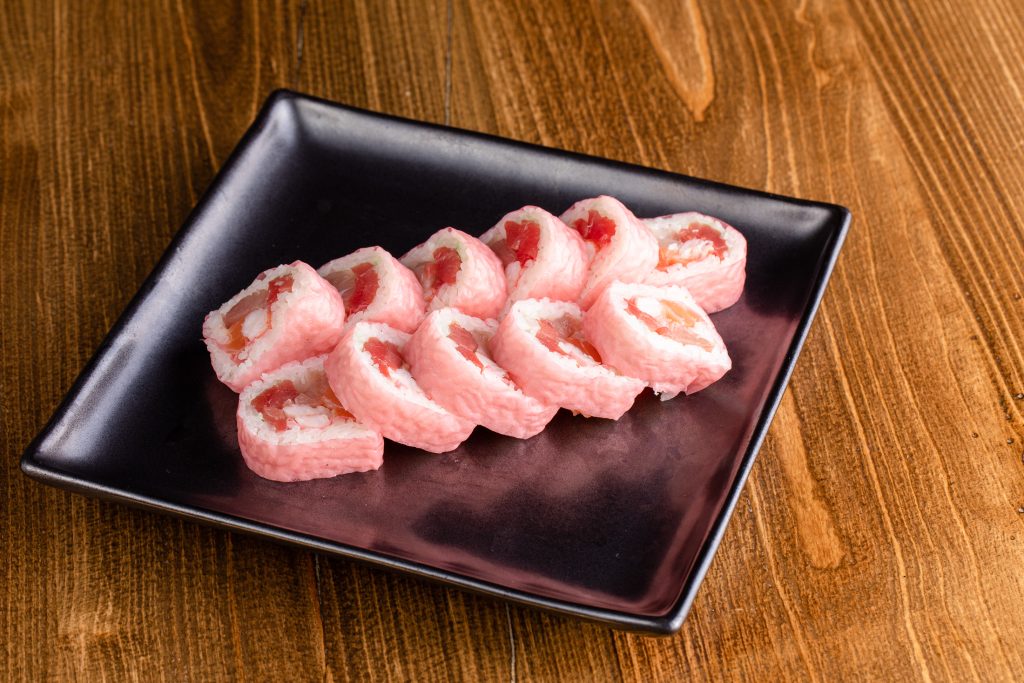 Ebi, fresh salmon, hamachi, tuna, and a touch of wasabi inside wrapped w/soy wrap