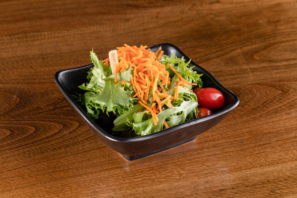 Mixed greens tossed in gluten-free dressing