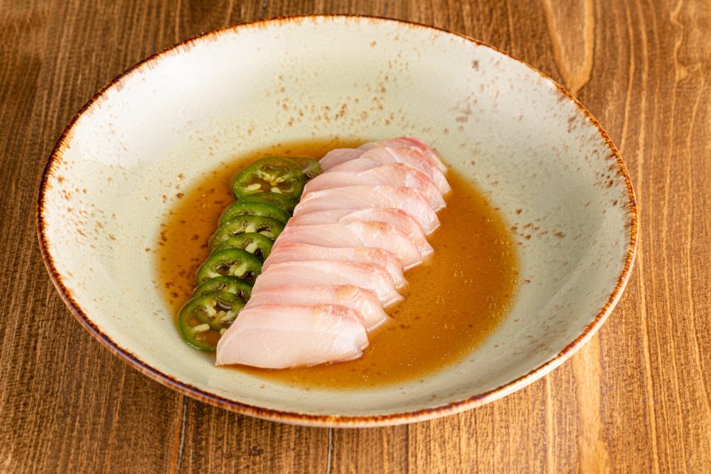 Yellowtail sashimi, minced garlic, thinly sliced jalapeños and special gluten-free citrus ponzu