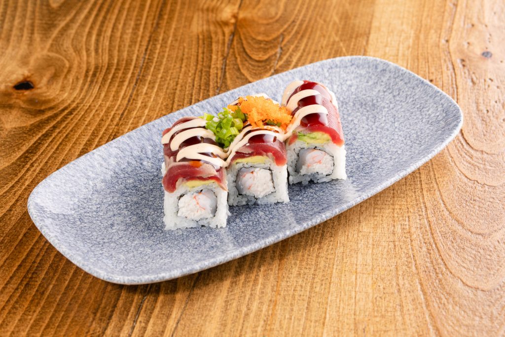 Scallop, crab mix, shrimp, avocado, seared tuna, sauce, masago, green onion