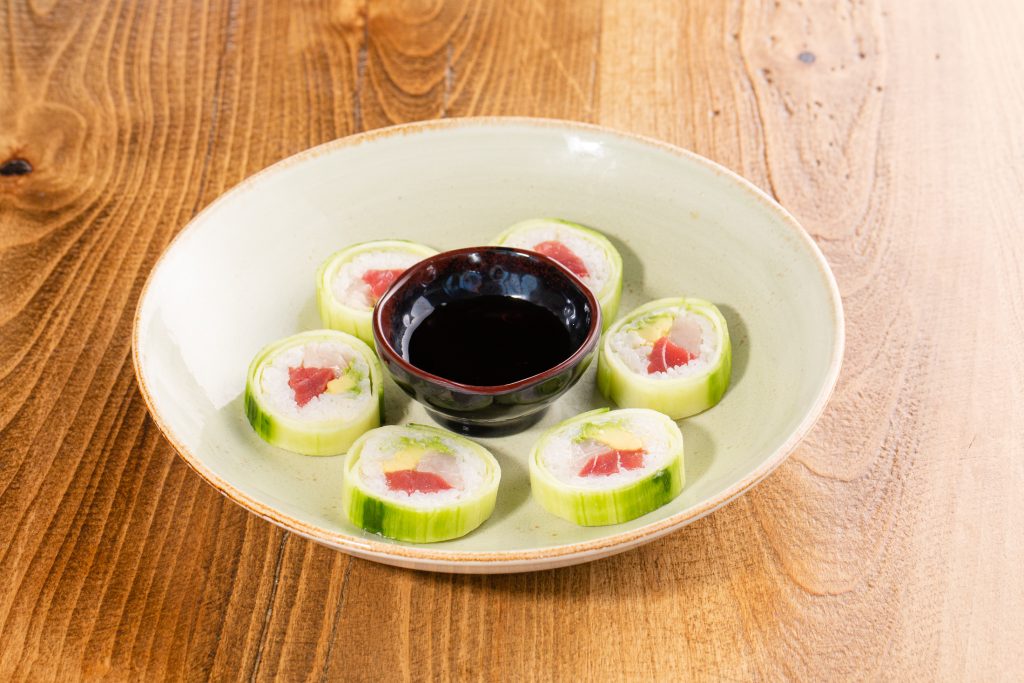Yellowtail, tuna, avocado, rice, wrapped with cucumber and soy wrap, ponzu