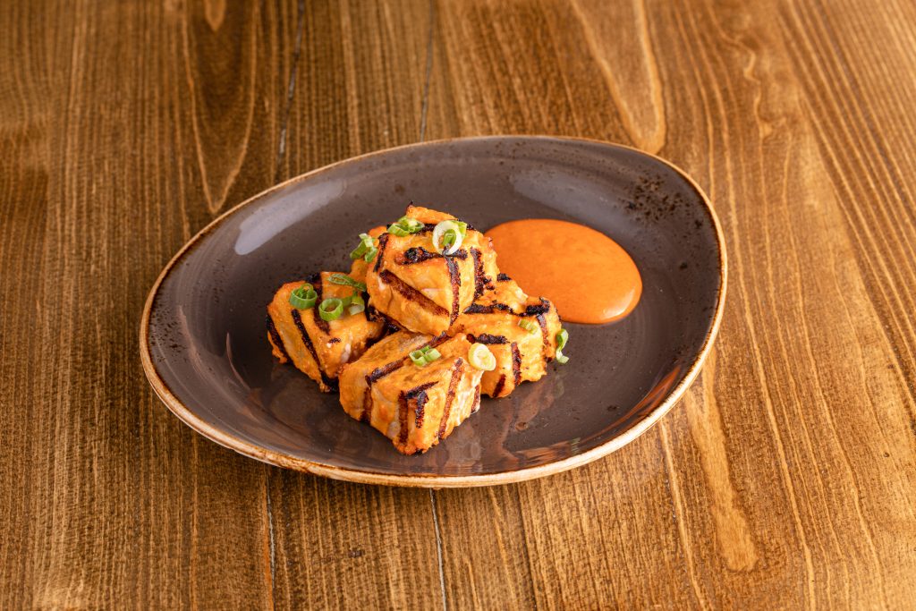 Grilled rare white tuna, spicy BBQ red or white sauce with green onion