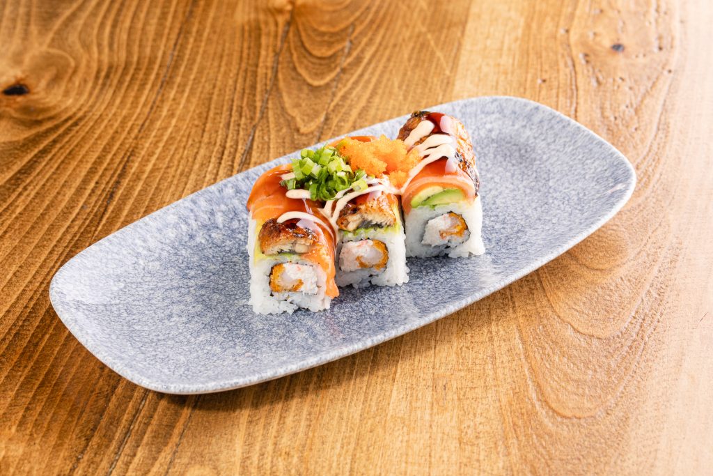 Crab mix, panko shrimp, avocado, eel, salmon, sauce, masago, green onion