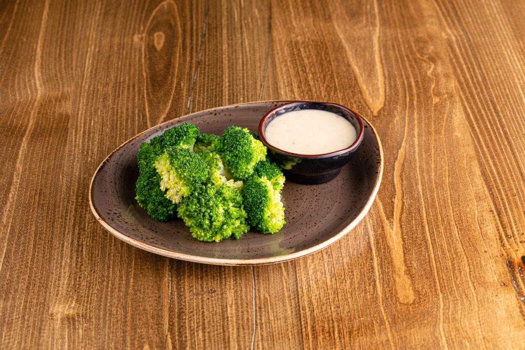 Steamed and chilled broccoli, creamy sesame dressing