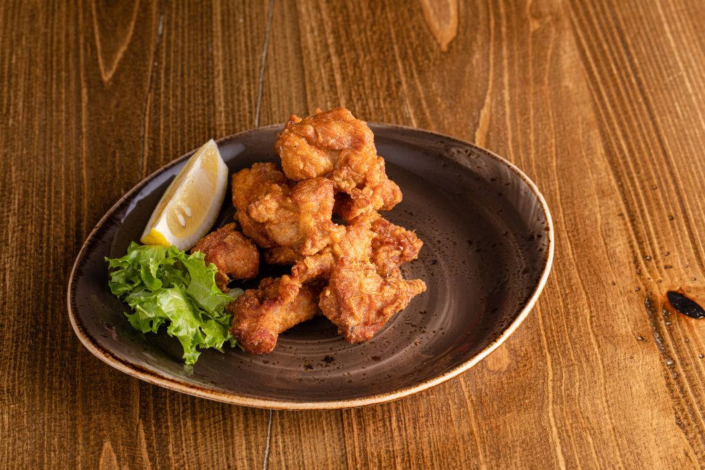 Seasoned crispy pieces of breaded chicken