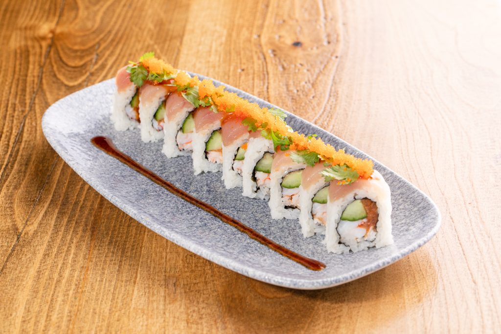 Spicy tuna, crab mix, shrimp, cucumber, topped with white tuna, cilantro, spicy ponzu, sweet teriyaki sauce, masago