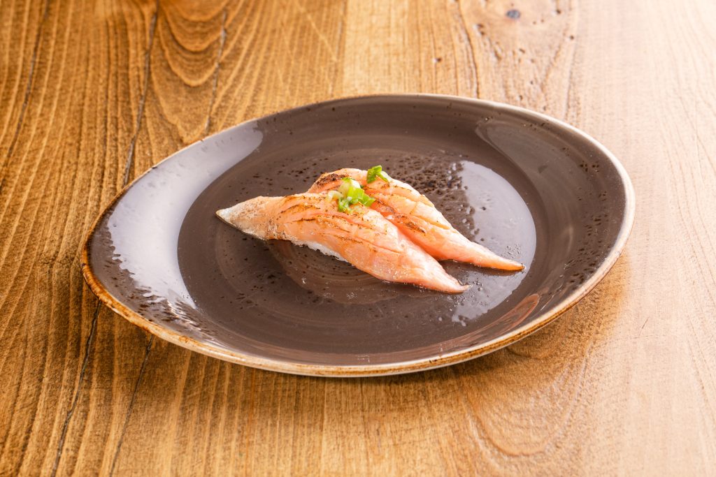 Two Salmon torched, yuzu shio, ponzu, onion nigiri