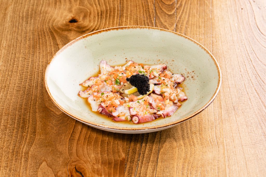 Thinly sliced octopus with Mikuni salsa, ponzu, tobiko, cilantro