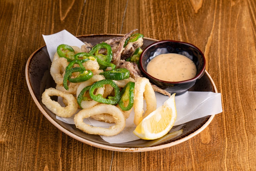 Lightly fried squid , tossed with yuzu salt, jalepenos, spicy Mikuni sauce